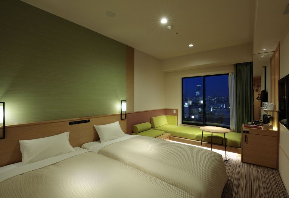 Where to Stay in Osaka 2026: 6 Best Areas + 12 Hotels CANDEO HOTELS Osaka Namba twin guest room with city view