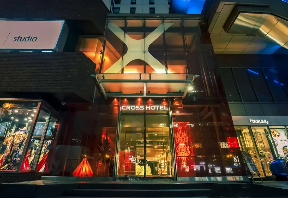 Where to Stay in Osaka 2026: 6 Best Areas + 12 Hotels Cross Hotel Osaka entrance at night