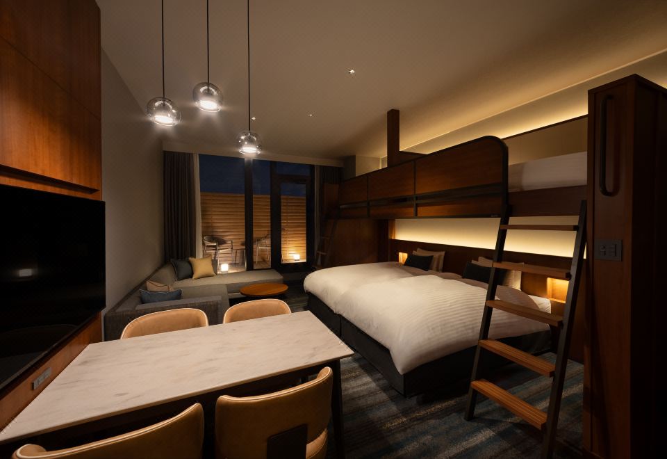 Where to Stay in Osaka 2026: 6 Best Areas + 12 Hotels Namba Oriental Hotel family guest room with bunk bed and dining table