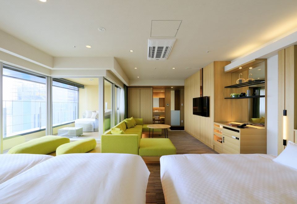 Where to Stay in Osaka 2026: 6 Best Areas + 12 Hotels Spacious twin guest room at The Singulari Hotel and Skyspa at Universal Studios Japan